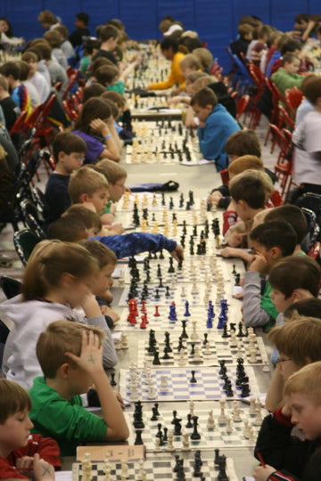 Row of children chess players competing at a tournament in Minnesota, 2009.