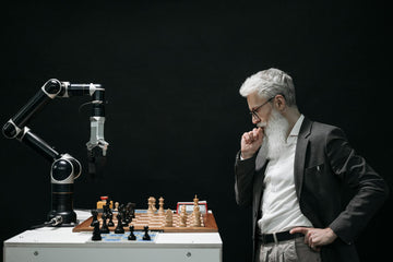 Man playing chess against a robot-pexels-pavel-danilyuk