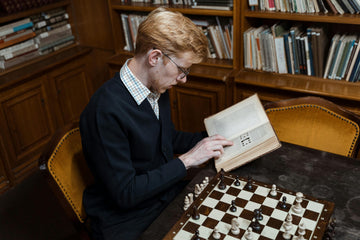 pexels-tima-miroshnichenko-readingchessbook